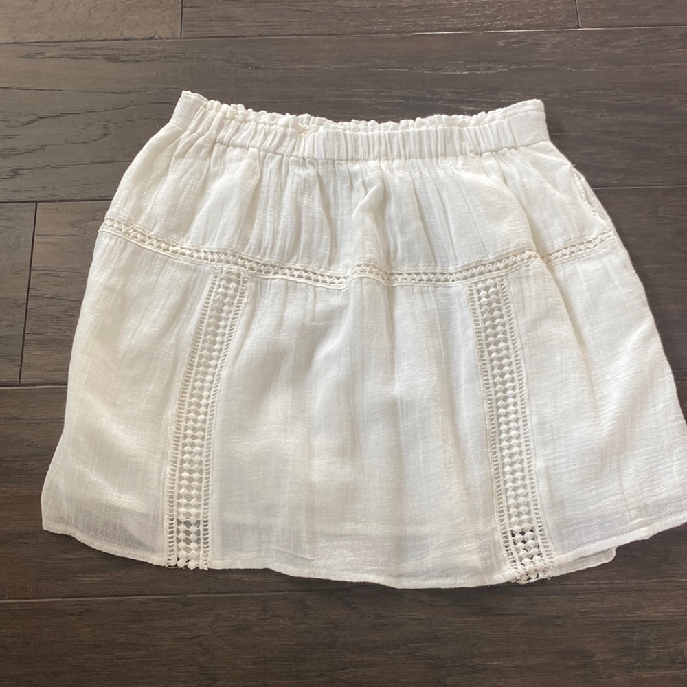 Madewell cream mini skirt.